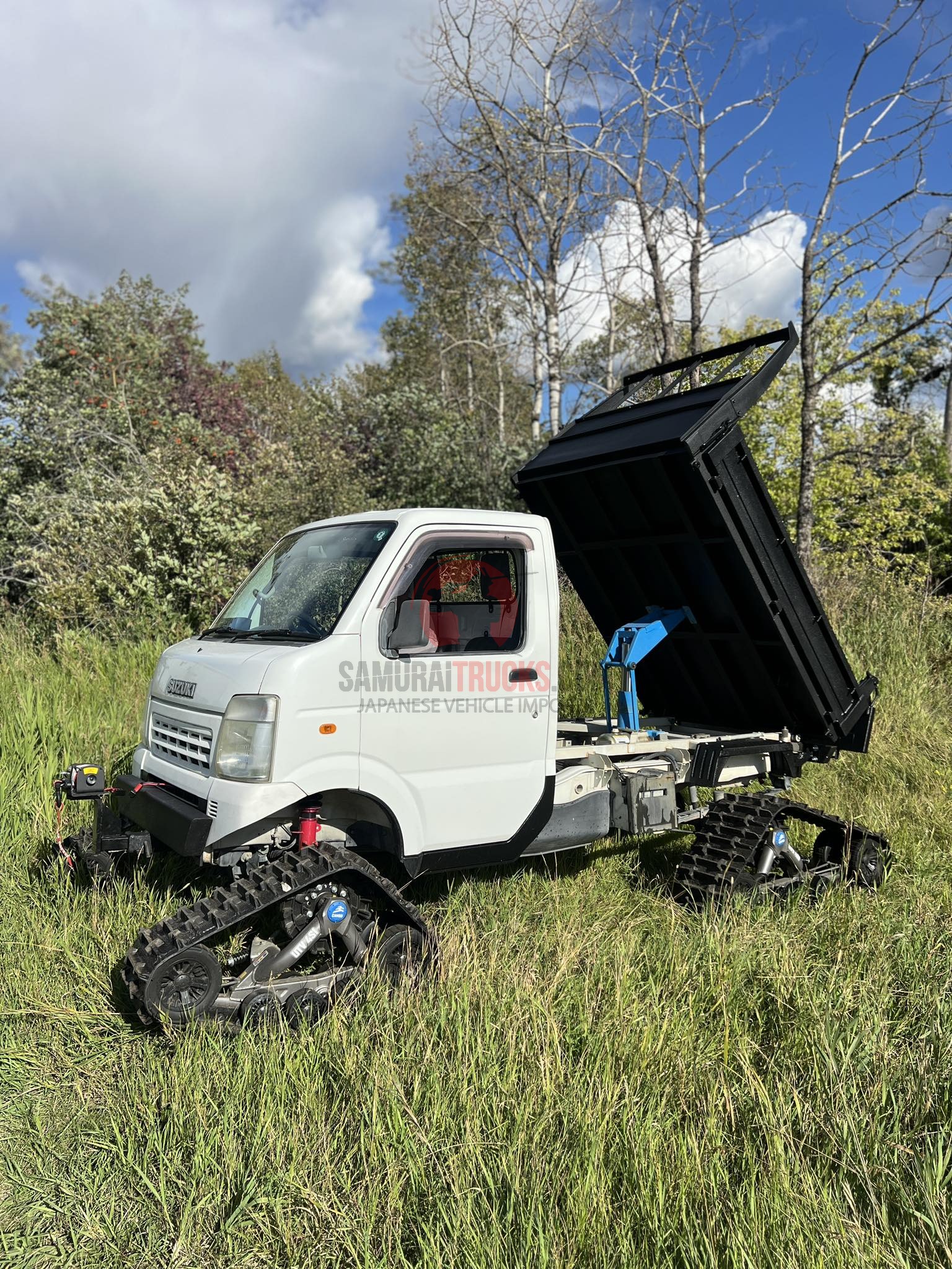 Tracked Suzuki Carry kei truck